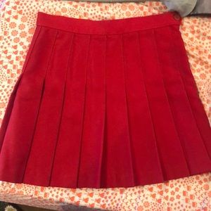 Red American apparel pleaded skirt brand new
